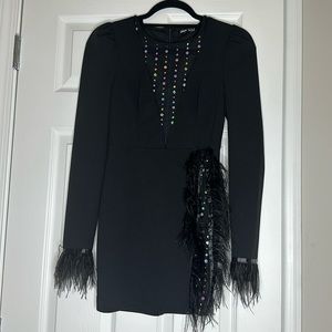 Black mini dress with feathers
